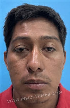 Booking photo: Julio Cornejo